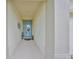 Bright entryway with light teal door and tile floor at 7411 Windport Ln, Apollo Beach, FL 33572