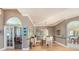 Bright dining room with hardwood floors and access to adjacent rooms at 331 Lewis Rd, Lithia, FL 33547