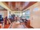 Bright office space with wood floors and a window overlooking the backyard at 331 Lewis Rd, Lithia, FL 33547