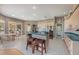 Kitchen boasts a large island, ample cabinetry, and teal countertops at 331 Lewis Rd, Lithia, FL 33547