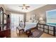 Large main bedroom with wood floors, a comfortable bed, and ample closet space at 331 Lewis Rd, Lithia, FL 33547