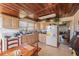 Kitchen features light wood cabinets and appliances at 331 Lewis Rd, Lithia, FL 33547