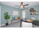 Bright home office with desk, seating, and natural light at 11294 Linden Depot Rd, San Antonio, FL 33576