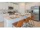 Modern kitchen island with quartz countertops and pendant lighting at 11294 Linden Depot Rd, San Antonio, FL 33576