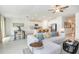 Open living room and kitchen layout with a large sectional sofa at 11294 Linden Depot Rd, San Antonio, FL 33576