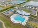 Community pool, playground, and basketball court at 602 Olive Conch St, Ruskin, FL 33570