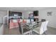 Kitchen with dark cabinets and a large island at 602 Olive Conch St, Ruskin, FL 33570