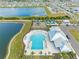 Aerial view of community pool, playground, and clubhouse at 602 Olive Conch St, Ruskin, FL 33570