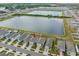 Aerial view of home near lake at 602 Olive Conch St, Ruskin, FL 33570