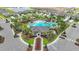 Aerial view of community pool and clubhouse at 5079 Eagle Rock Dr, Wimauma, FL 33598