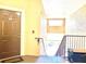 Stairwell entrance to condo unit with brown door at 5125 Palm Springs Blvd # 9302, Tampa, FL 33647