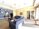 Spacious community room featuring comfortable sofas and a flat-screen TV at 5125 Palm Springs Blvd # 9302, Tampa, FL 33647