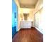Bathroom with vanity, shower, and dark wood-look flooring at 5125 Palm Springs Blvd # 9302, Tampa, FL 33647