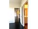 Bedroom with dark floors and access to bathroom and living area at 5125 Palm Springs Blvd # 9302, Tampa, FL 33647