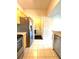 Kitchen features stainless steel appliances and light wood cabinets at 5125 Palm Springs Blvd # 9302, Tampa, FL 33647