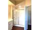 Bathroom features a shower/tub combo and a walk-in closet at 5125 Palm Springs Blvd # 9302, Tampa, FL 33647