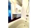 Bathroom with a bathtub and double vanity at 5125 Palm Springs Blvd # 9302, Tampa, FL 33647