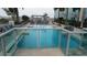 Community pool with plenty of lounge chairs at 777 N Ashley Dr # 1103, Tampa, FL 33602