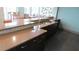 Community bar with a granite countertop and mosaic tile accents at 777 N Ashley Dr # 1103, Tampa, FL 33602