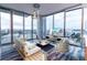 Modern living room with floor to ceiling windows at 777 N Ashley Dr # 1103, Tampa, FL 33602