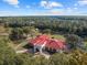 Aerial view of home showcasing grand entryway at 11623 Innfields Dr, Odessa, FL 33556