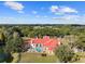 Aerial view of home with pool and expansive lot at 11623 Innfields Dr, Odessa, FL 33556