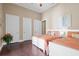 Bedroom with two twin beds and hardwood floors at 11623 Innfields Dr, Odessa, FL 33556