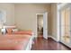 Bedroom with two twin beds and hardwood floors at 11623 Innfields Dr, Odessa, FL 33556