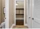 Large walk-in closet with ample shelving and hanging space at 11623 Innfields Dr, Odessa, FL 33556