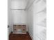Walk-in closet with wire shelving and storage at 11623 Innfields Dr, Odessa, FL 33556
