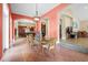 Spacious dining area with terracotta floors and views into the Gathering room at 11623 Innfields Dr, Odessa, FL 33556