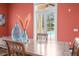 Bright dining room opens to a view of the pool through French doors at 11623 Innfields Dr, Odessa, FL 33556