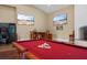 Game room features a pool table and bar area at 11623 Innfields Dr, Odessa, FL 33556