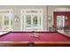 Pool table with a view of the backyard and pool at 11623 Innfields Dr, Odessa, FL 33556
