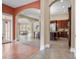 Open floor plan showcasing the kitchen, living, and dining areas at 11623 Innfields Dr, Odessa, FL 33556