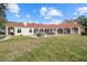 Inviting pool area with spacious patio and lounge chairs at 11623 Innfields Dr, Odessa, FL 33556