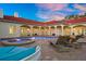 Inviting pool and spa area with lounge chairs, perfect for relaxation at 11623 Innfields Dr, Odessa, FL 33556