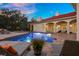 Stunning pool with patio and comfortable lounge chairs at 11623 Innfields Dr, Odessa, FL 33556