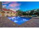 Relaxing pool and patio area, perfect for outdoor entertaining at 11623 Innfields Dr, Odessa, FL 33556