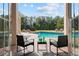 Inviting pool area with lounge chairs and lush landscaping at 11623 Innfields Dr, Odessa, FL 33556