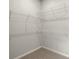Walk-in closet with wire shelving providing ample storage at 11217 Livewell Ct, Venice, FL 34293