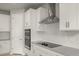 Modern kitchen with stainless steel appliances and white cabinets at 11217 Livewell Ct, Venice, FL 34293
