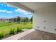 Covered patio overlooking a backyard at 11217 Livewell Ct, Venice, FL 34293