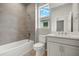 Bathroom with a bathtub, toilet and single vanity at 11223 Livewell Ct, Venice, FL 34293