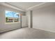 Spacious bedroom with carpeted floor and window at 11223 Livewell Ct, Venice, FL 34293