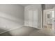 Bright bedroom with carpet, double door closet and en-suite bathroom at 11223 Livewell Ct, Venice, FL 34293