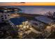 This aerial view shows a spacious home on a large lot with ocean access at 5032 W Longfellow Ave, Tampa, FL 33629