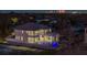 Expansive modern home features a private backyard oasis with a sparkling pool and a skyline view at 5032 W Longfellow Ave, Tampa, FL 33629