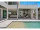 Beautiful backyard with pool, patio, and outdoor living space seamlessly blending indoor and outdoor living at 5032 W Longfellow Ave, Tampa, FL 33629