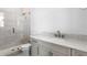 This bathroom has a walk-in shower and a vanity sink at 5032 W Longfellow Ave, Tampa, FL 33629